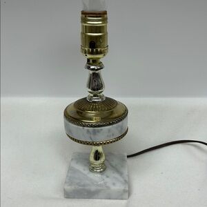 Vintage Hollywood Regency white marble ,brass and gold tone metal accent lamp